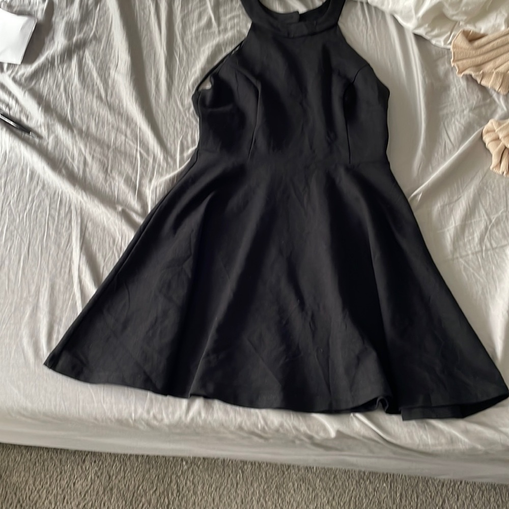 Little black flared it backless strapped dress